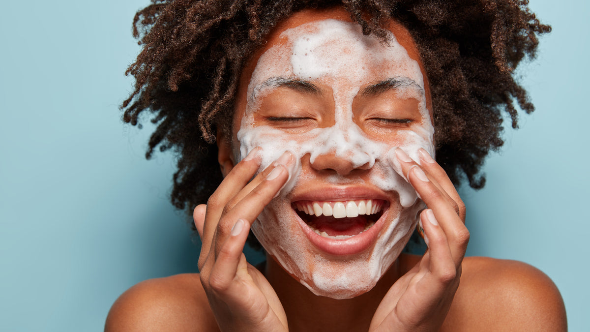 black-woman-cleansing-skin-foaming-face-wash