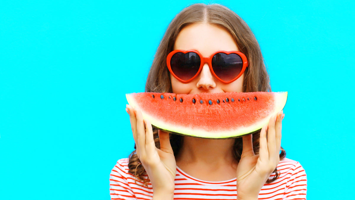 brunette woman with watermelon