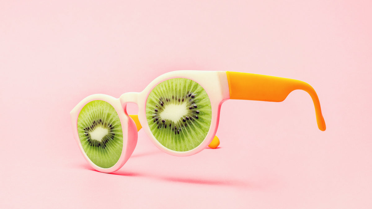 kiwi sunglasses on pink background