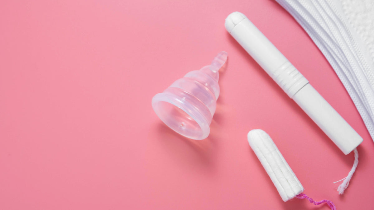 menstrual protection on pink background