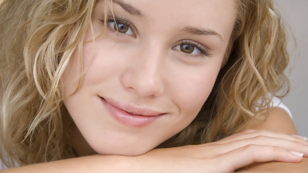 close-up of young blonde woman with amazing skin