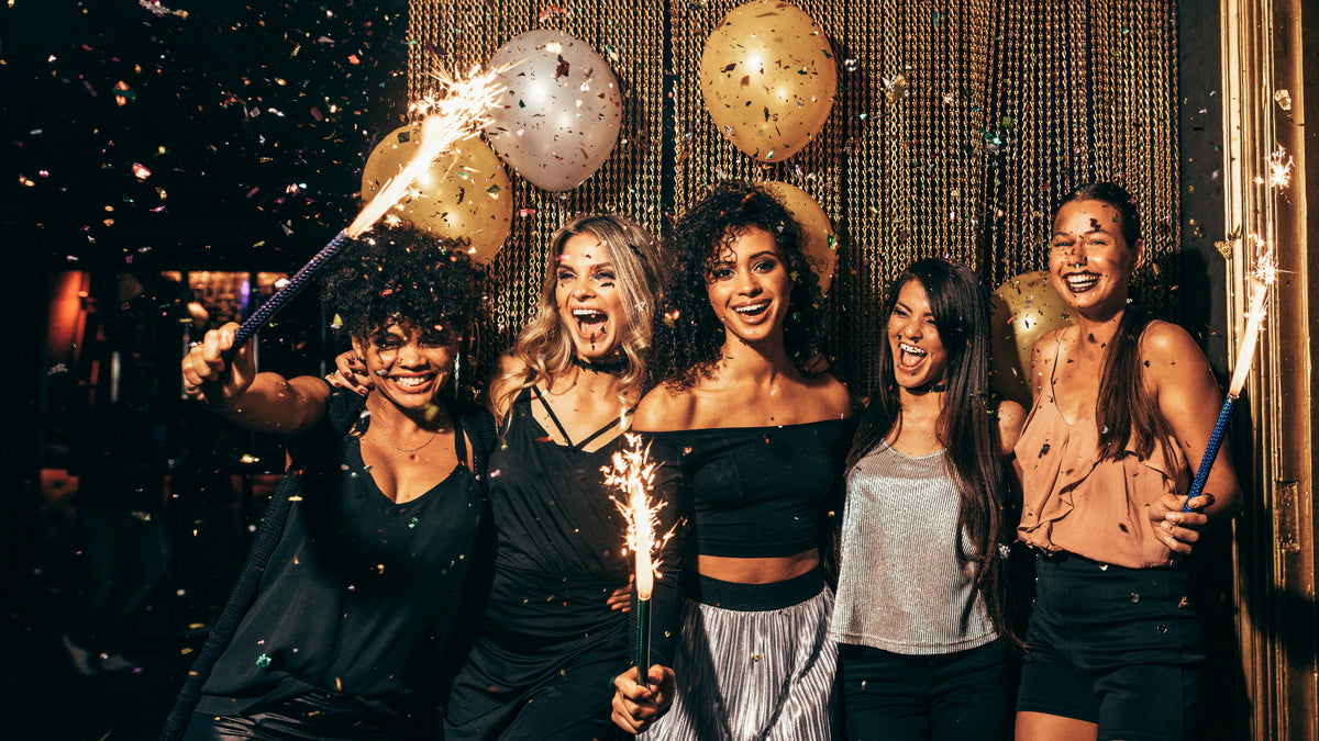 five girlfriends partying and laughing