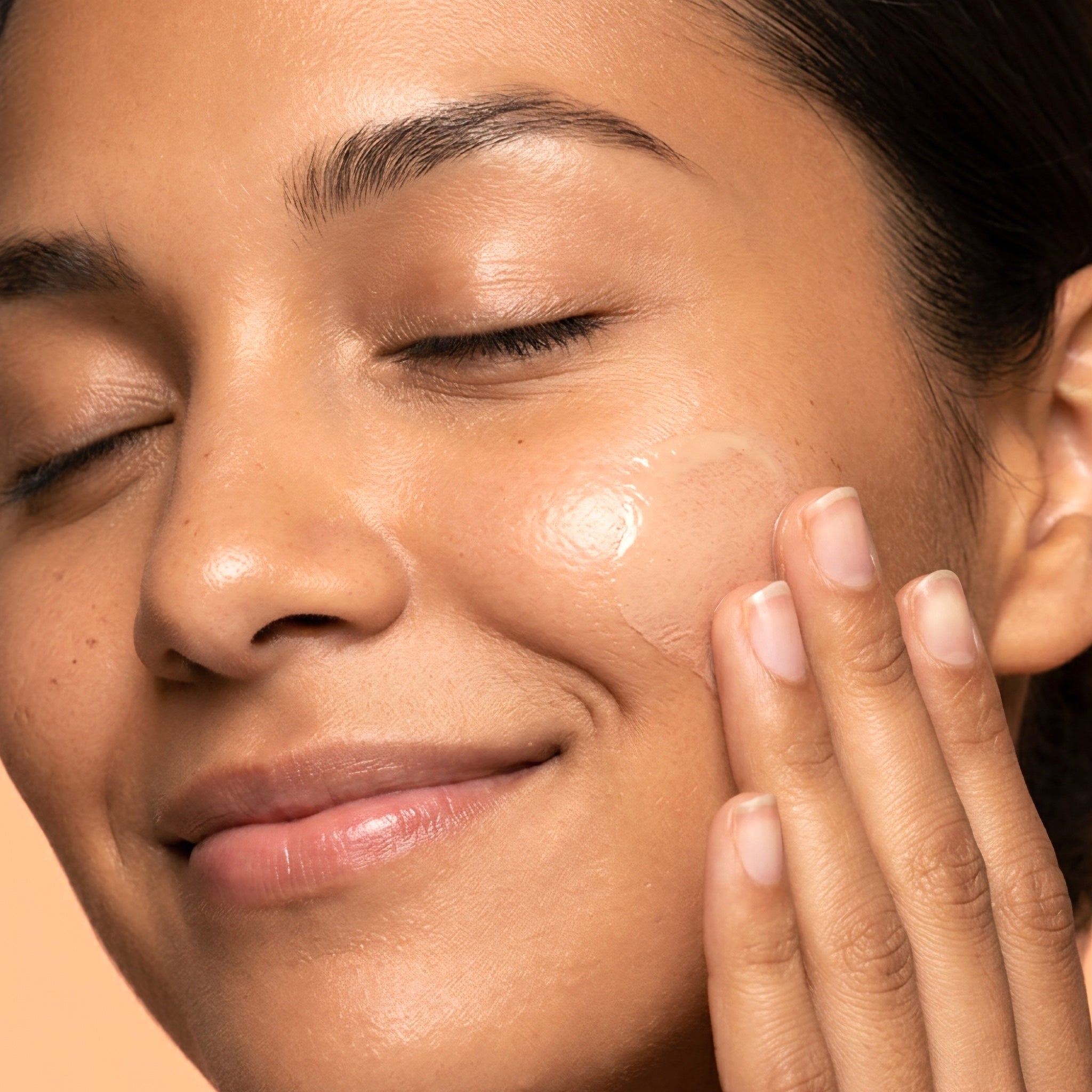 SPF 30 Mineral Sunscreen Serum — applied to skin